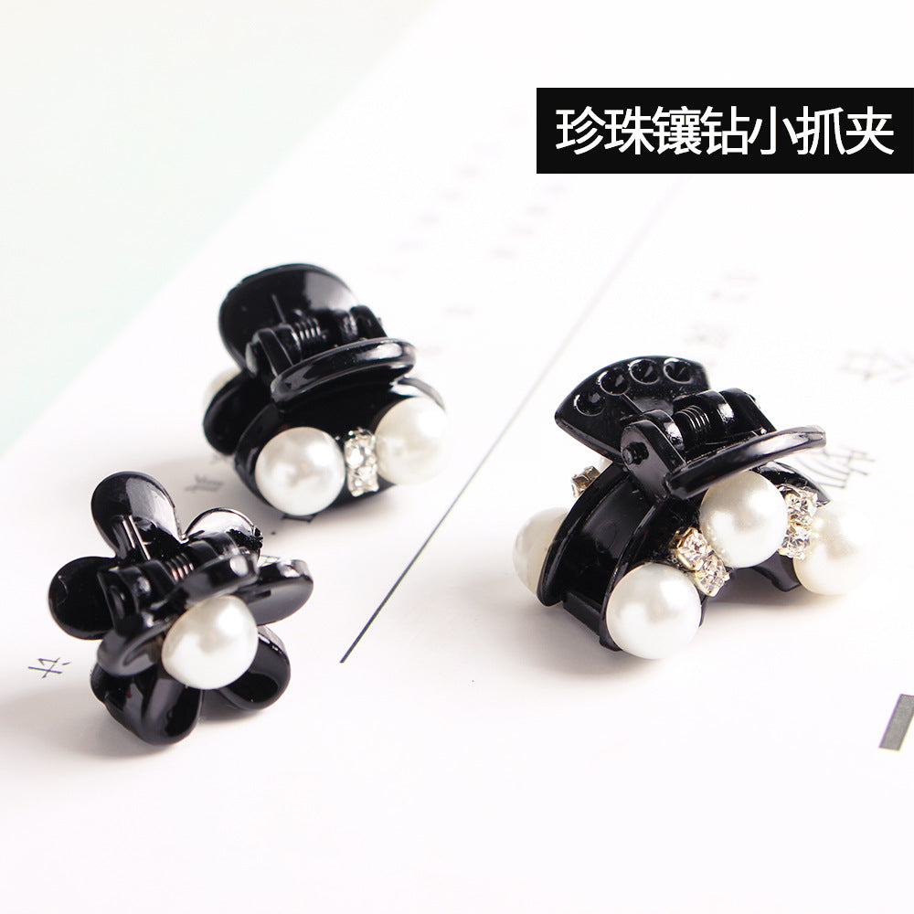 珍珠蝴蝶結誇張鯊魚夾－商品主圖｜https://igowo.tw/