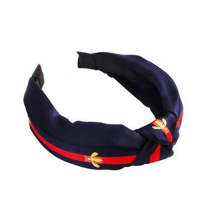 布面蜜蜂扭結髮箍－金色+紅黑帶款細節｜https://igowo.tw/