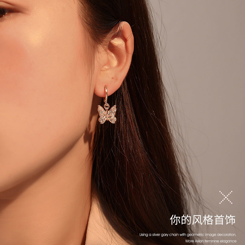 鋯石蝴蝶耳墜－商品主圖｜https://igowo.tw/