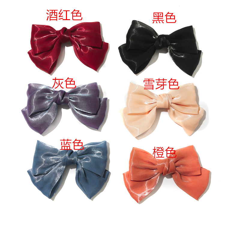 網紗蝴蝶結扭結髮夾－清風紗黑色髮夾款實拍｜https://igowo.tw/