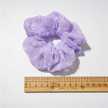 紫色雛菊大腸圈髮圈－四瓣花紫色款實拍｜https://igowo.tw/