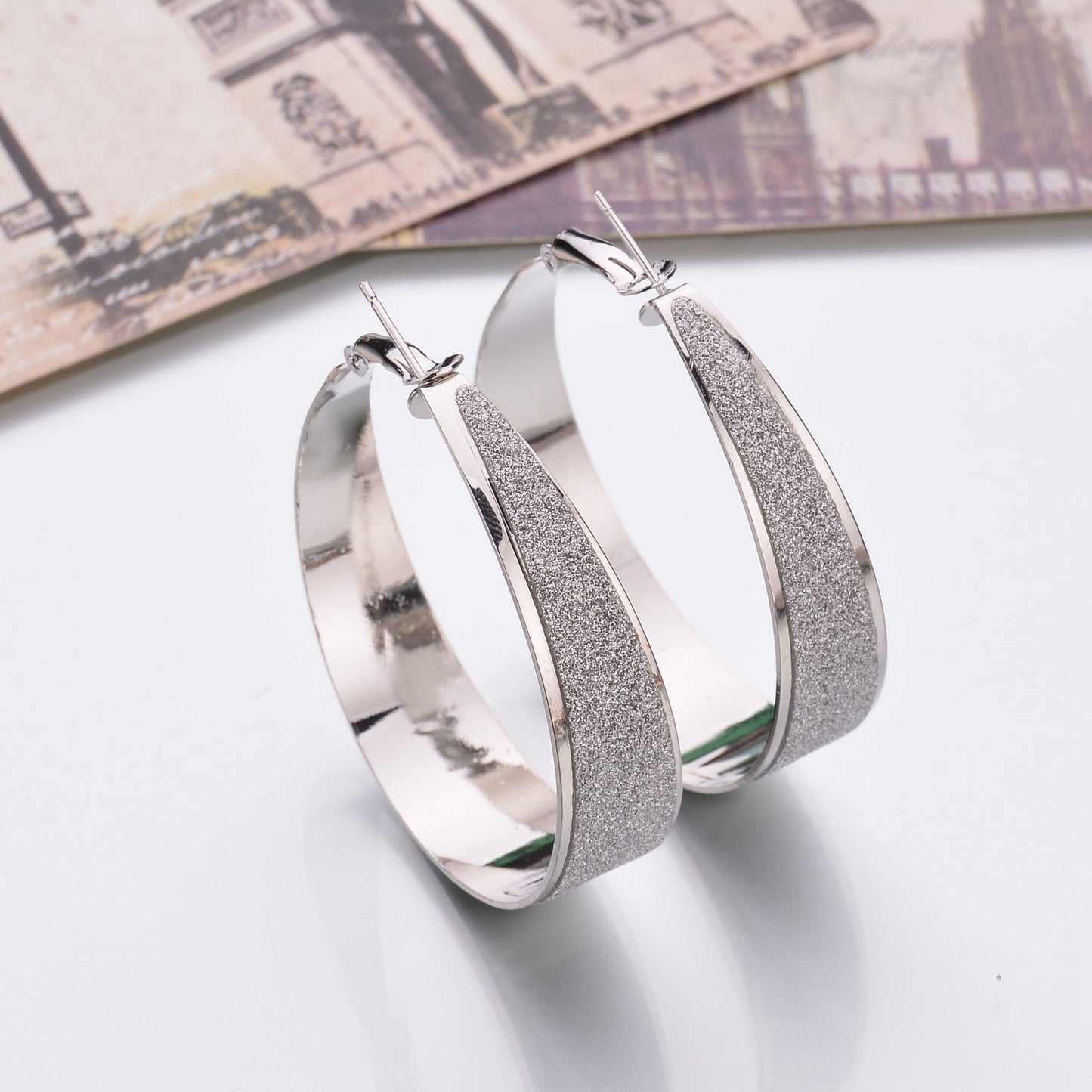 鋯石金屬圓圈磨砂耳釘