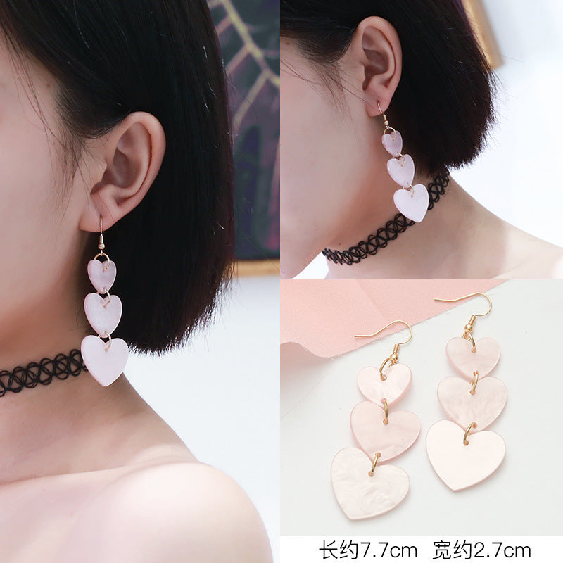 粉色流蘇長版耳釘－細節特寫6｜https://igowo.tw/