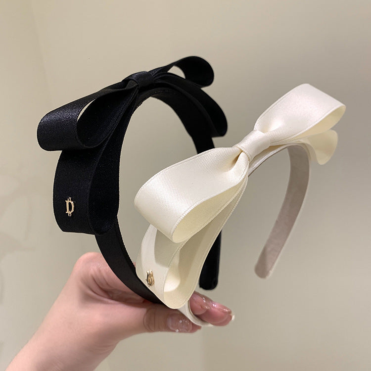 蝴蝶結簡約髮箍－商品主圖｜https://igowo.tw/