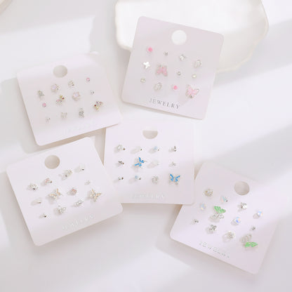 粉色蝴蝶耳釘－商品主圖｜https://igowo.tw/