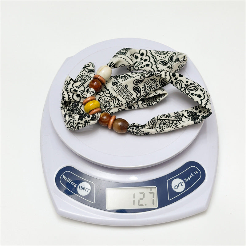 串珠布面可調式項鍊－黑白腰果花款細節1｜https://igowo.tw/