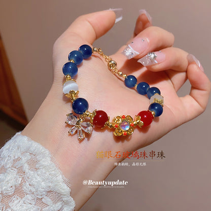 鋯石蝴蝶結貓眼石玻璃珠串珠抽拉式手鏈時尚氣質手串高級感手飾女