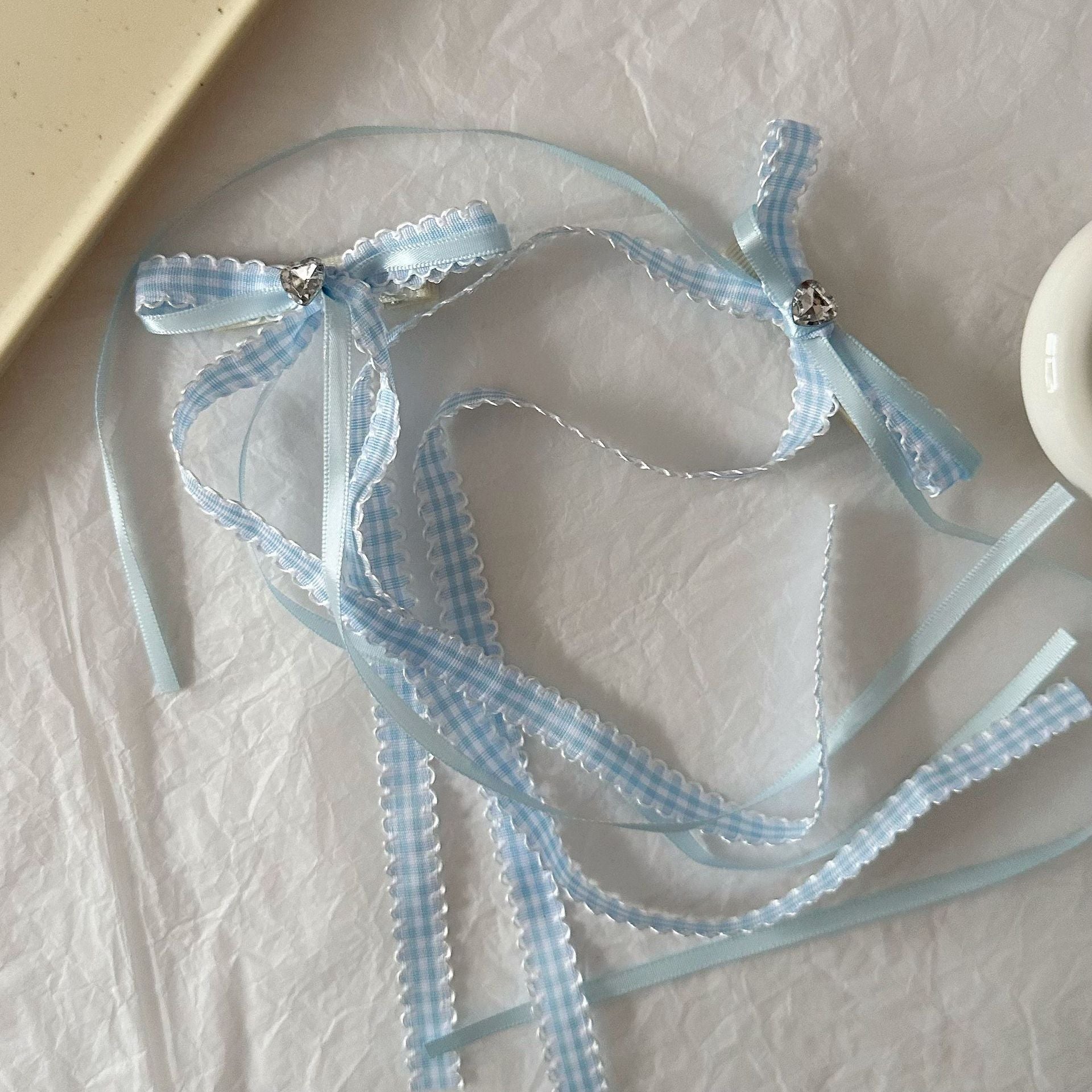 藍色緞帶蝴蝶結髮夾－商品主圖｜https://igowo.tw/