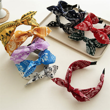 布面扭結髮箍－兔耳朵腰果藏青色款細節｜https://igowo.tw/