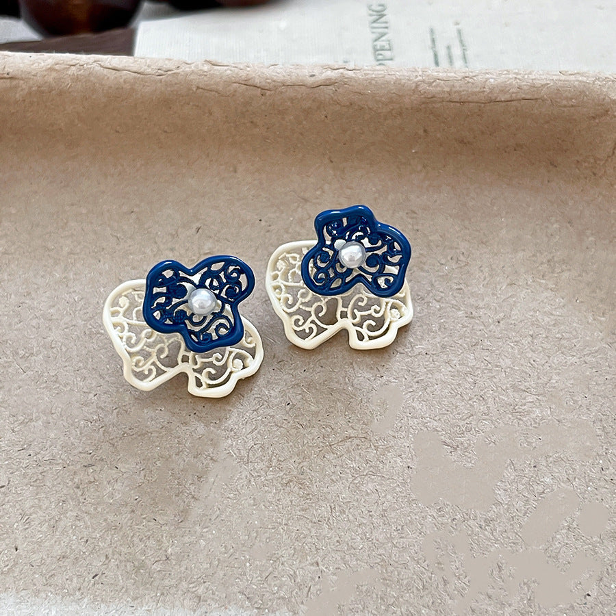 珍珠銀針花朵鏤空耳釘