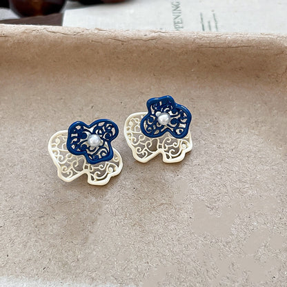 珍珠銀針花朵鏤空耳釘