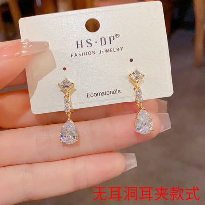鋯石水滴流蘇耳夾－商品主圖｜https://igowo.tw/