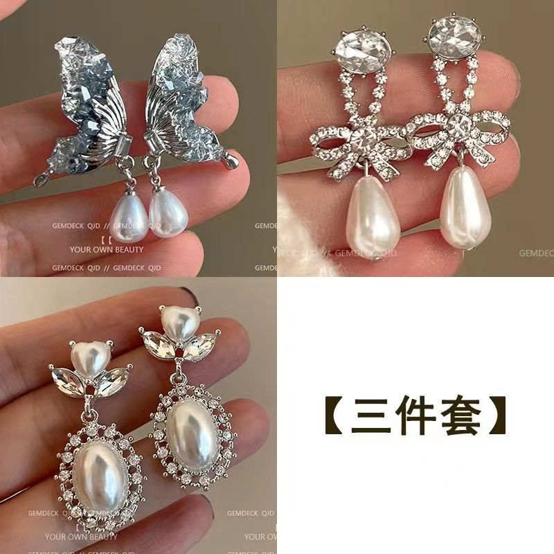 珍珠銀針蝴蝶耳釘－細節特寫1｜https://igowo.tw/