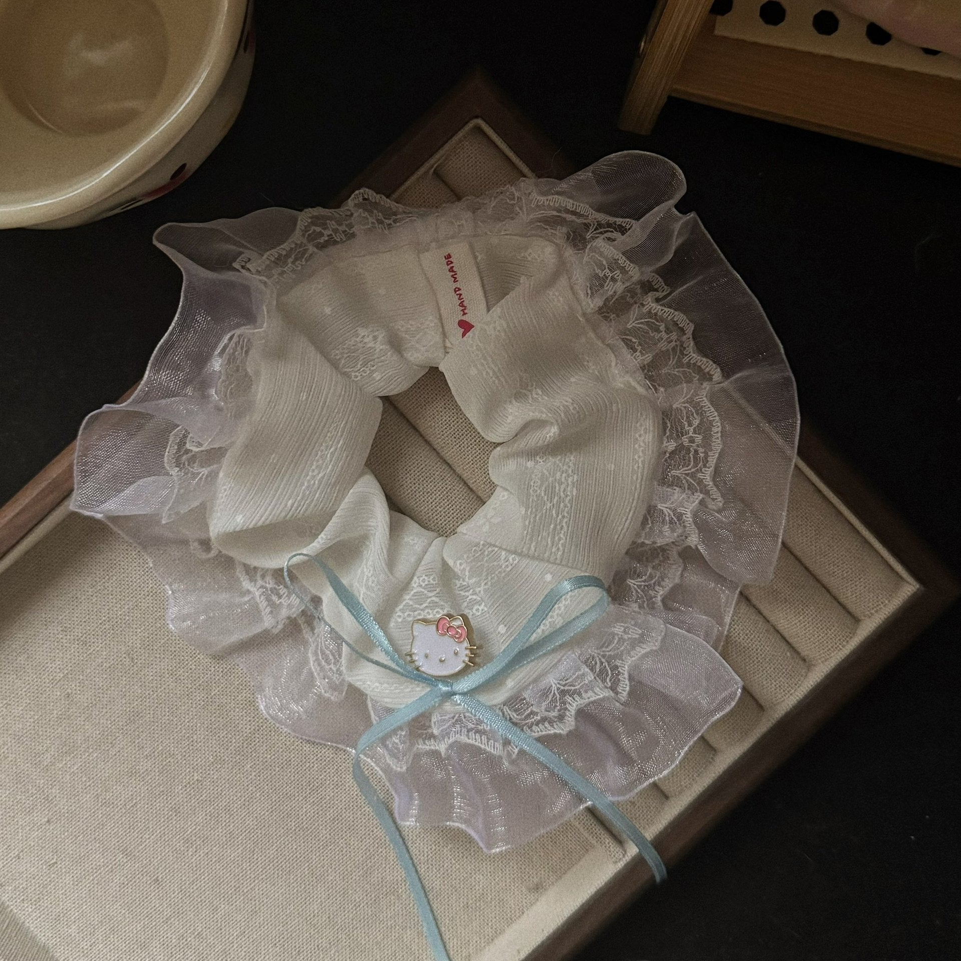 藍色領結貓咪髮圈－商品主圖｜https://igowo.tw/