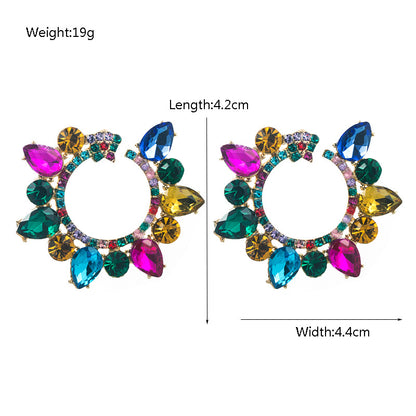金屬花朵鑲鑽耳環－商品主圖｜https://igowo.tw/