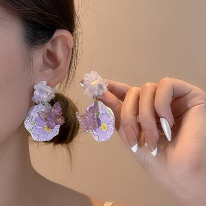 紫色銀針蝴蝶花朵耳環－商品主圖｜https://igowo.tw/