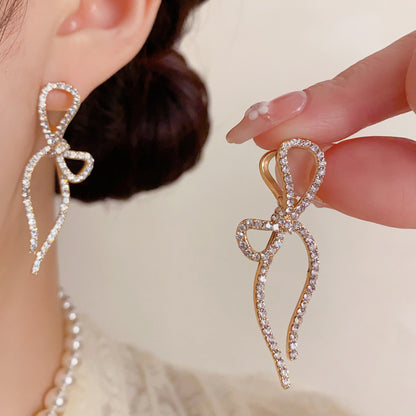 鋯石蝴蝶結流蘇耳扣－商品主圖｜https://igowo.tw/