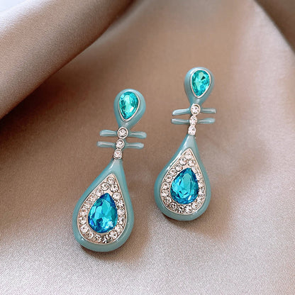 藍色銀針愛心蝴蝶耳釘－細節特寫39｜https://igowo.tw/