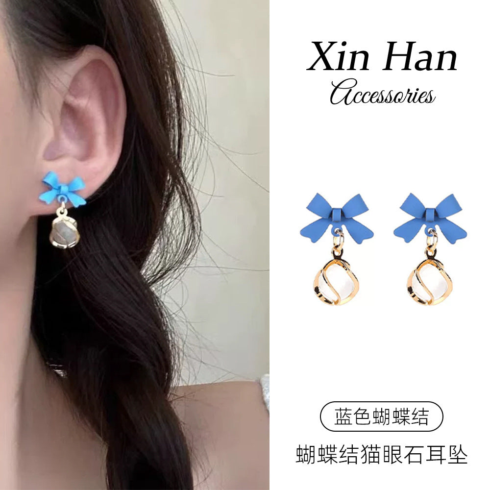 貓眼石蝴蝶結耳釘－商品主圖｜https://igowo.tw/