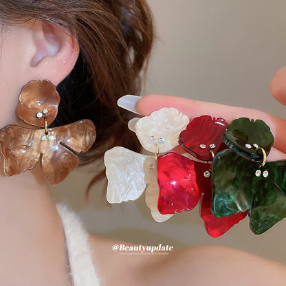 樹脂銀針花朵鑲鑽耳環－商品主圖｜https://igowo.tw/