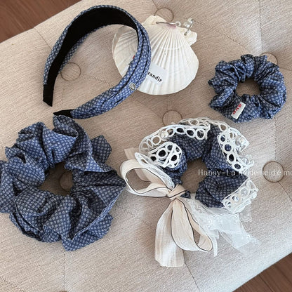 蕾絲碎花蝴蝶結髮圈－商品主圖｜https://igowo.tw/
