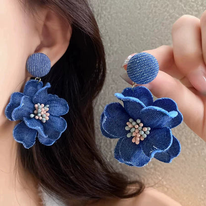 白色花朵耳環－紫款細節｜https://igowo.tw/
