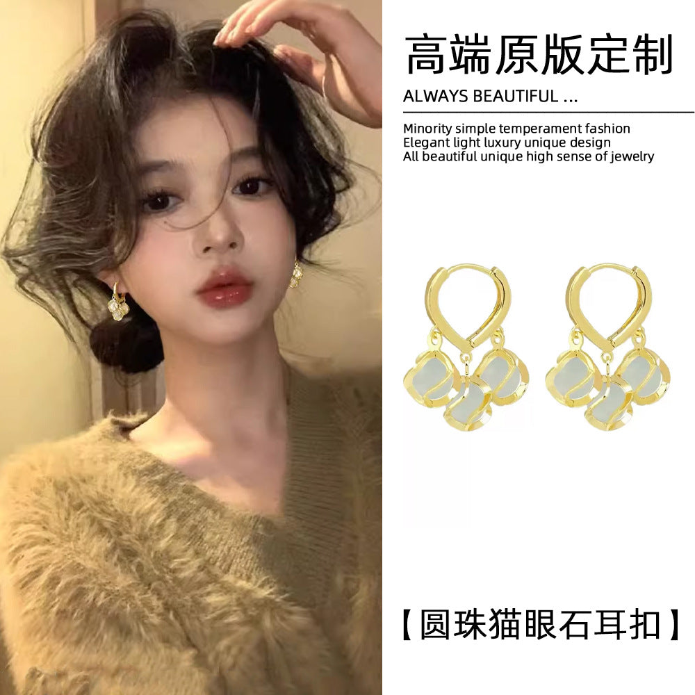 金色貓眼石鈴蘭耳扣－商品主圖｜https://igowo.tw/