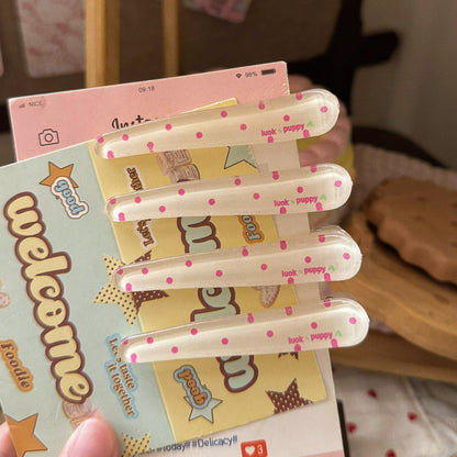 黃色波點髮夾－商品主圖｜https://igowo.tw/