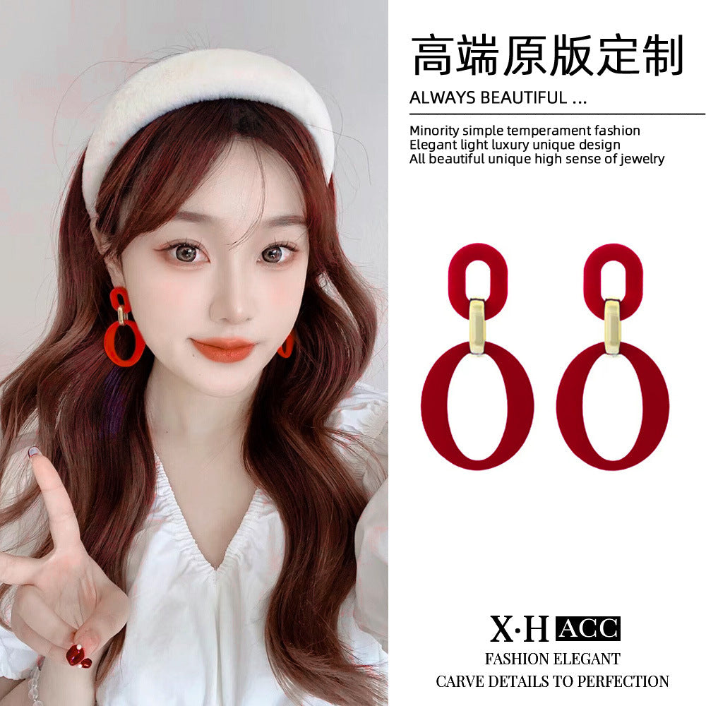 紅色銀針圓圈誇張耳釘－商品主圖｜https://igowo.tw/