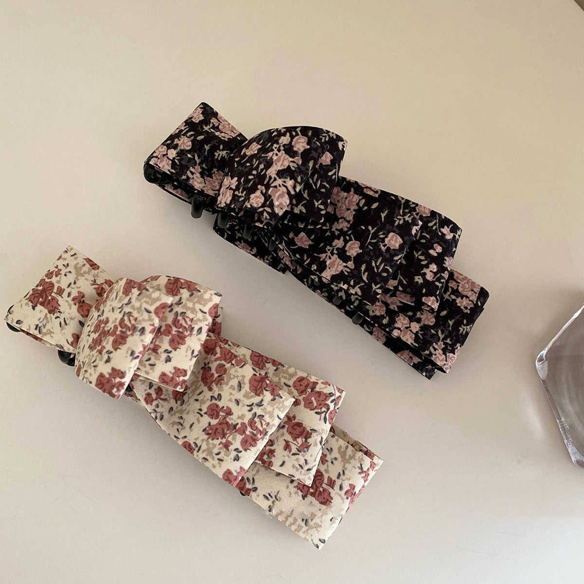 碎花蝴蝶結髮夾－黑色碎花款實拍｜https://igowo.tw/