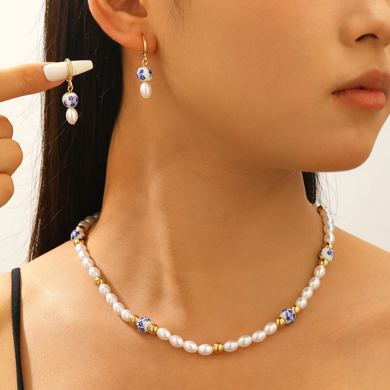 珍珠水滴項鍊耳環組－商品主圖｜https://igowo.tw/