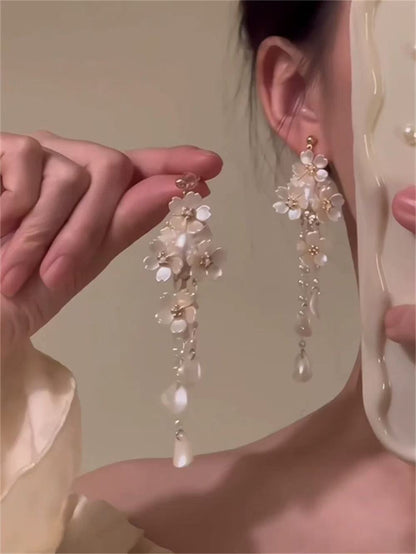 銀針鑲鉆鏤空花朵流蘇耳環女歐美時尚氣質耳釘輕奢高級感耳飾批發
