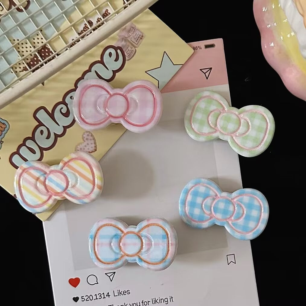 粉色領結髮夾－商品主圖｜https://igowo.tw/