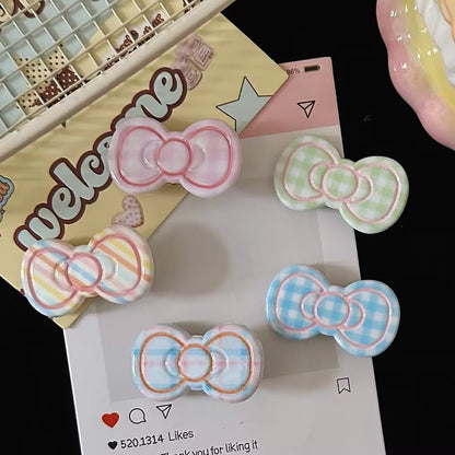 粉色領結髮夾－商品主圖｜https://igowo.tw/
