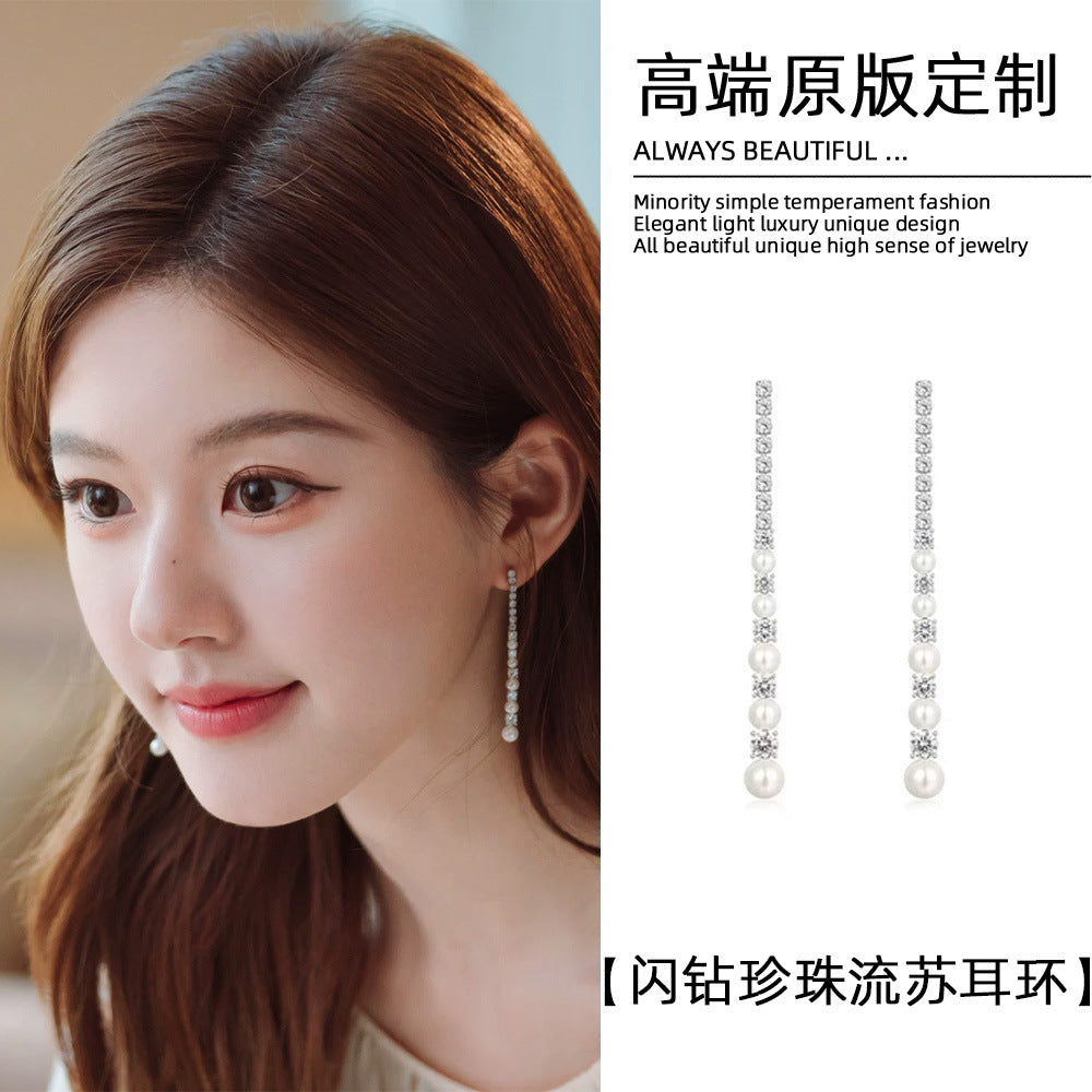 珍珠鋯石流蘇耳環－商品主圖｜https://igowo.tw/
