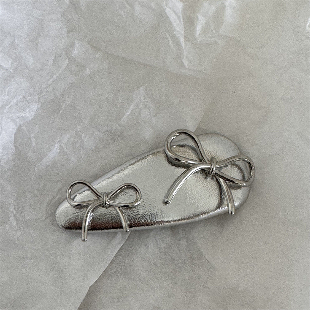 皮革金屬蝴蝶結髮夾