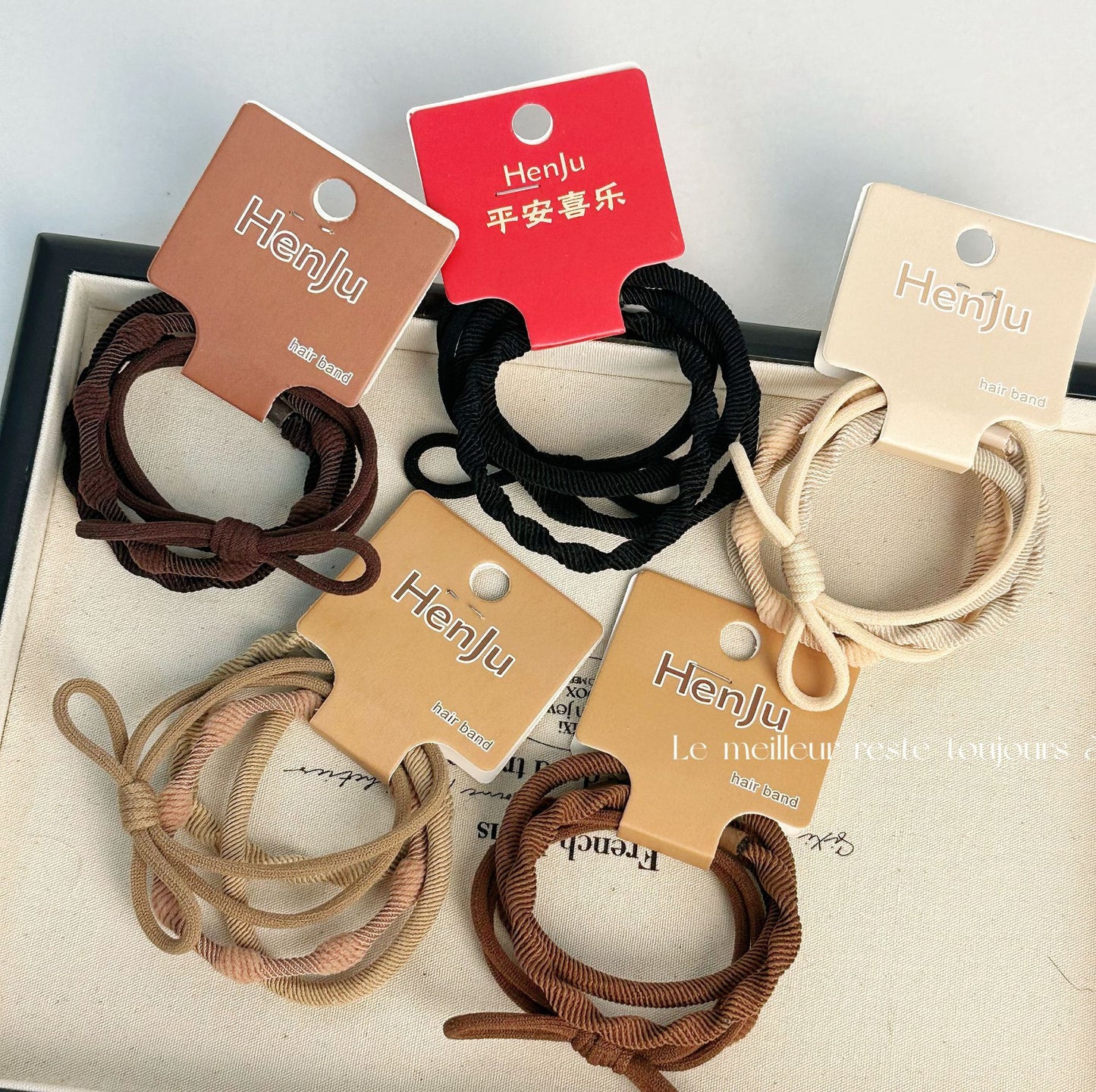 棕色彈力繩髮圈－橙款實拍｜https://igowo.tw/
