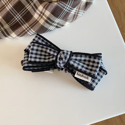 蝴蝶結簡約髮夾－灰色格紋款細節｜https://igowo.tw/