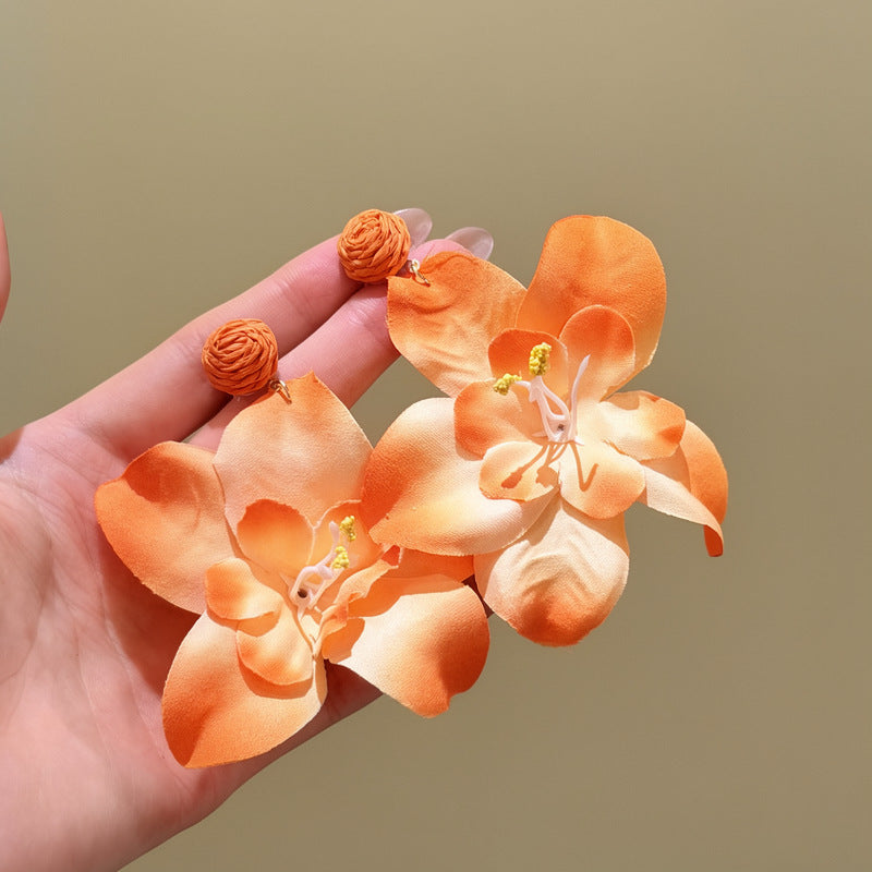 銀針塞納花房_海邊度假風橘色花朵耳釘2026新款夸張氣質耳環耳飾