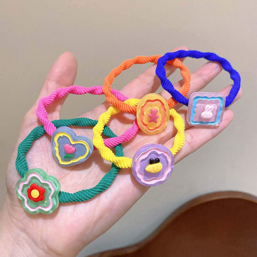 彈力繩花朵卡通髮圈－商品主圖｜https://igowo.tw/