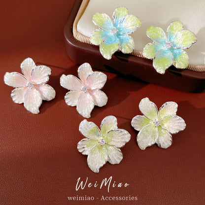 琺瑯鋯石花朵耳釘－商品主圖｜https://igowo.tw/