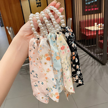 珍珠豹紋蝴蝶結髮圈－細節特寫4｜https://igowo.tw/
