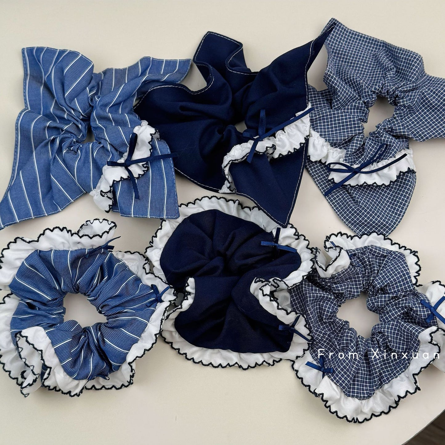 藍色蕾絲格紋髮圈－商品主圖｜https://igowo.tw/