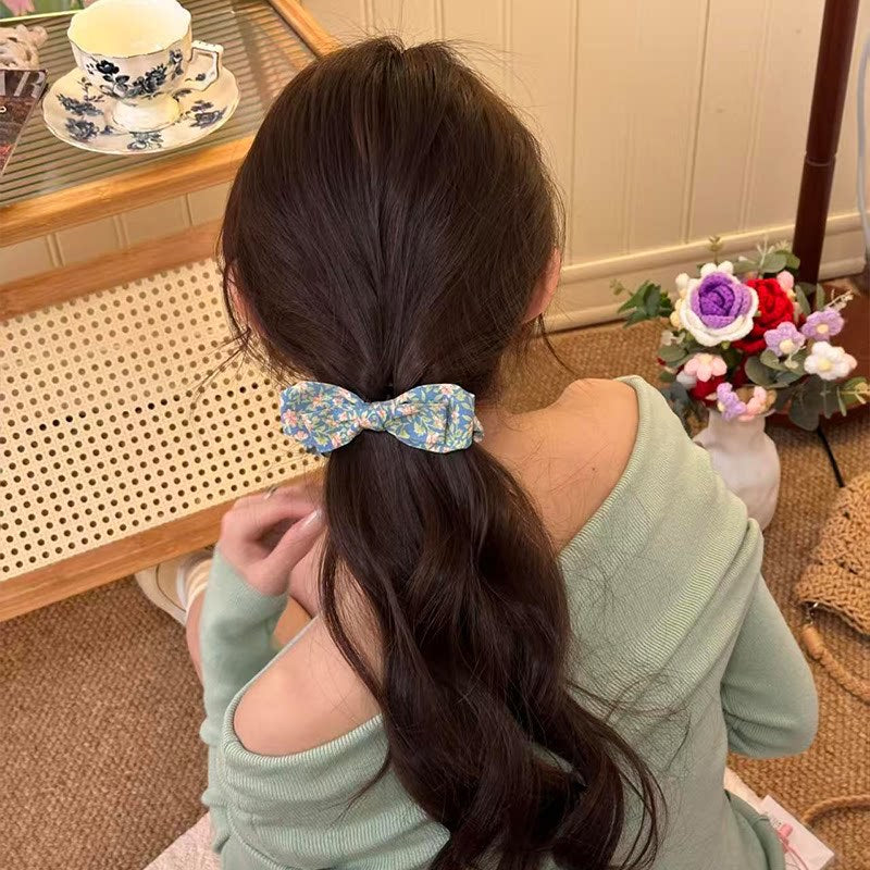碎花蝴蝶結髮夾－黃色碎花款細節｜https://igowo.tw/