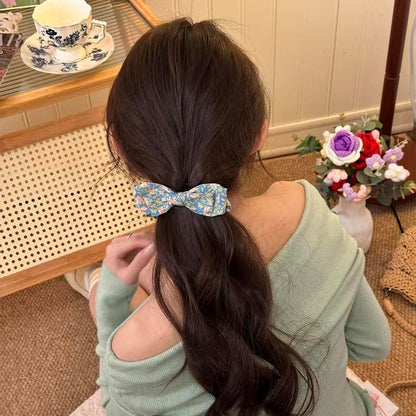 碎花蝴蝶結髮夾－黃色碎花款細節｜https://igowo.tw/