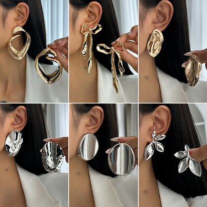 金屬蝴蝶結立體耳釘－商品主圖｜https://igowo.tw/