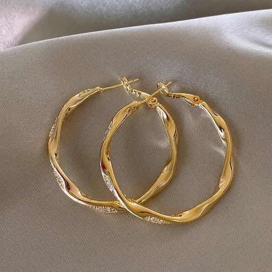金色圓圈微鑲耳環－商品主圖｜https://igowo.tw/