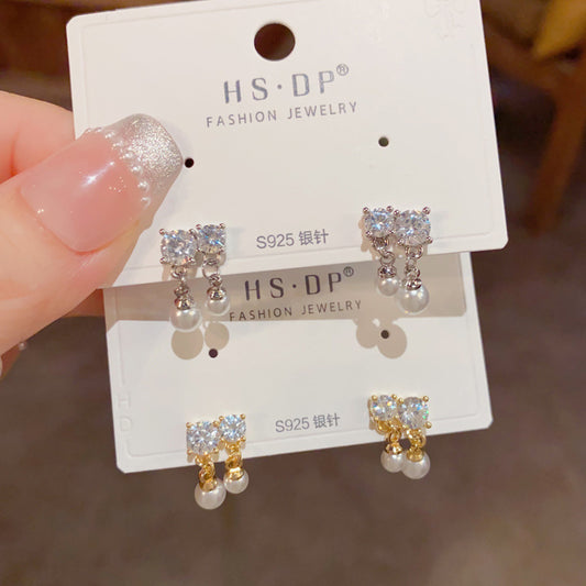 珍珠蝴蝶結流蘇耳墜－商品主圖｜https://igowo.tw/