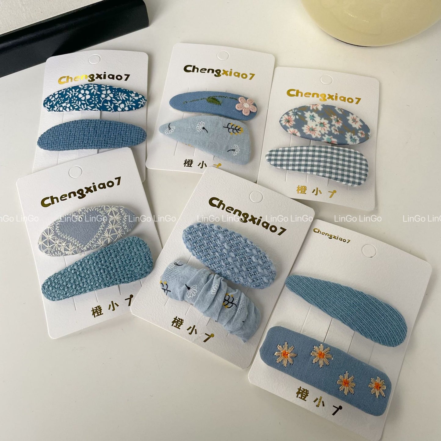 藍色碎花刺繡簡約髮夾－商品主圖｜https://igowo.tw/