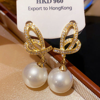 珍珠蝴蝶結復古耳環－細節特寫2｜https://igowo.tw/
